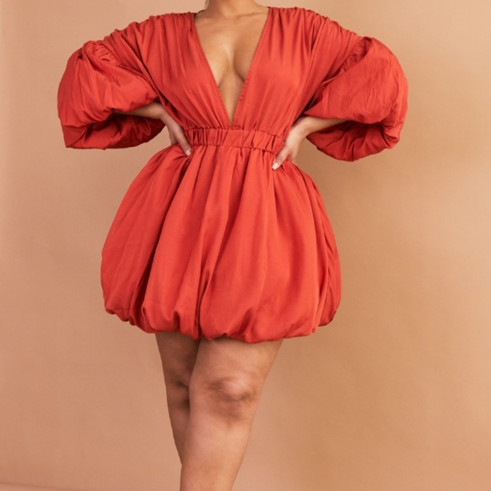Puff sleeved dress. Copper/orange color